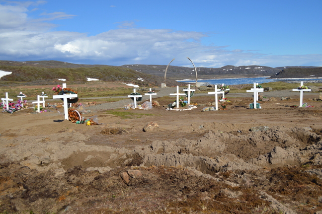 Sometimes open graves in the new cemetery in Apex fill with water, much to the chagrin of mourning families. Iqaluit city councillors plan to revisit the state of the cemetery at an upcoming Engineering and Public Works Committee meeting. (PHOTO BY STEVE DUCHARME)