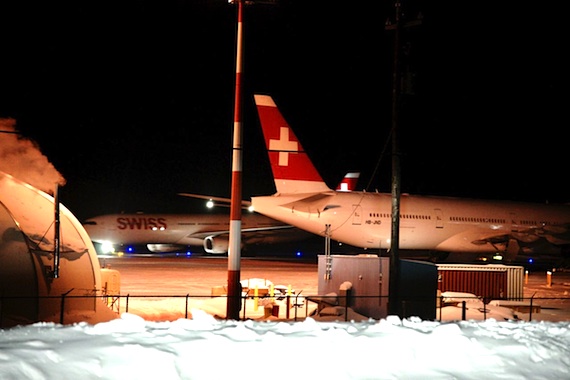 This photo taken by Frank Reardon during the early hours of Feb. 2 shows the Swiss International jet sent to Iqaluit to pick up the 200-plus passengers who spent more than 12 hours on the ground in Iqaluit when their aircraft, seen to the front, lost power in an engine near Iqaluit Feb. 1. (PHOTO BY FRANK REARDON PHOTOS)