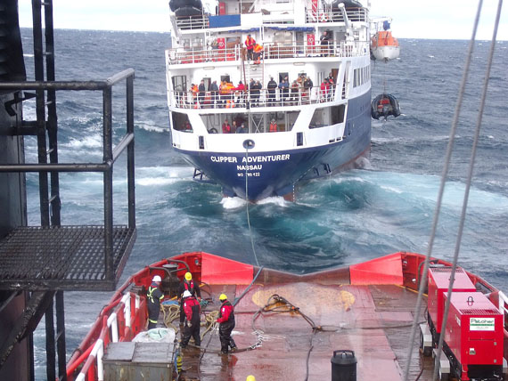 A photo from August 2010 shows a Canadian Coast Guard ship towing the Clipper Adventurer. (FILE PHOTO)