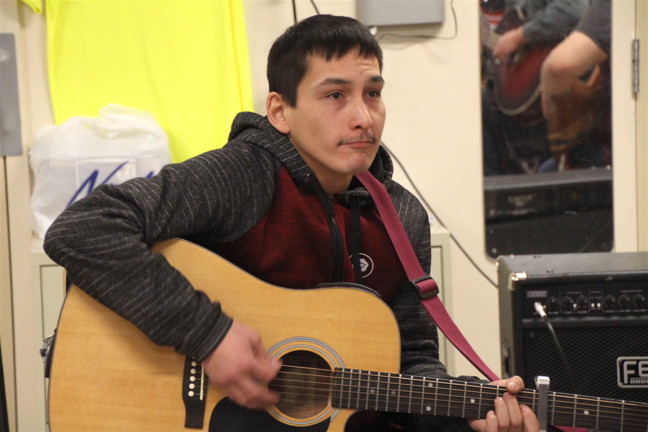 Lazarus Qattalik jams with Iqaluit musicians during an Alianait practice session Jan. 17. (PHOTO BY BETH BROWN)

