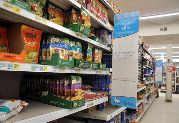 The blue labels here in Kuujjuaq's Northern store indicate food items which receive a subsidy through the KRG-managed cost-of-living program. (PHOTO BY SARAH ROGERS) 