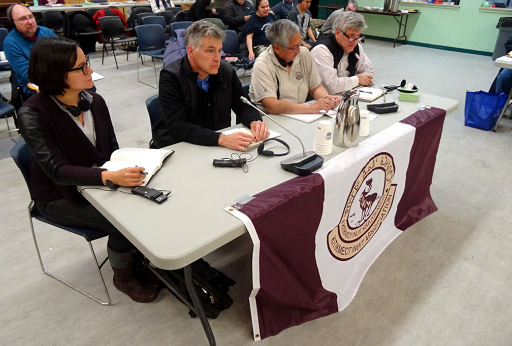 Representatives of the Nunavut Resource Corp. appear before the annual general meeting of the Kitikmeot Inuit Association on Oct. 16, 2017. The NRC, wholly owned by the KIA, is the entity that handles the Grays Bay Port and Road proposal. From left to right: lawyer Jennifer King; lawyer Rod Northey; NRC President Charlie Evalik; and Scott Northey, NRC's chief operating officer. (PHOTO BY JANE GEORGE)