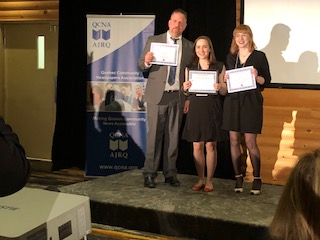 Nunatsiaq News reporter Beth Brown (centre) receives her award for best feature story at the Quebec Community Newspaper Association awards in Sainte-Adèle, Que., on Friday, June 8. (PHOTO BY PATRICIA LIGHTFOOT)