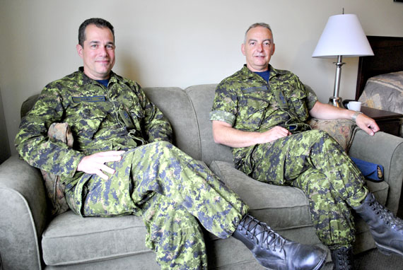Brigadier-General Guy Hamel, the new commander of Joint Task Force North, with Chief Warrant Officer Gilles Laroche, a JTFN staff member based in Yellowknife. (PHOTO BY JIM BELL)