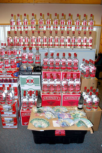 This past March, police in Iqaluit made a massive seizure of liquor kept illegally for sale. Police allege that somebody, using legal permits, ordered at least $250,000 worth of liquor from southern Canada to sell illegally in the community. Four Iqaluit men face Liquor Act charges arising from the RCMP investigation. (RCMP HANDOUT PHOTO)