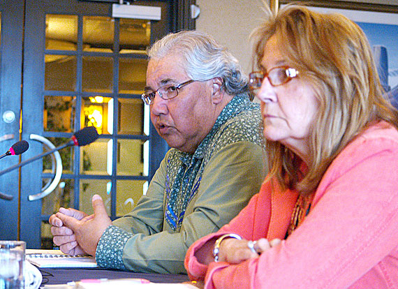 Murray Sinclair, chair of the Truth and Reconciliation Commission, left, speaks to delegates at the Inuit Tapiriit Kanatami general meeting in Iqaluit June 24, as commissioner Marie Wilson looks on. Sinclair promised at the time that a distinct Inuit story would be part of the commission's work. (PHOTO BY CHRIS WINDEYER)
