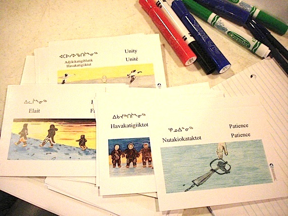 Participants at a March 30 poverty reduction workshop in Iqaluit started off their discussions by choosing among cards showing words they think are important in life and society. (PHOTO BY JANE GEORGE)