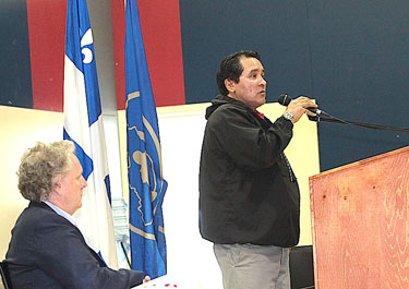 Quebec premier Jean Charest listens to Makivik Corp. president Pita Aatami on Aug. 8 in Kangiqsulajjuaq when Quebec announced it would give Makivik $3 million to acknowledge the slaughter of Inuit sled dogs in the 1950s and 60s. (PHOTO COURTESY OF MAKIVIK CORP.)
