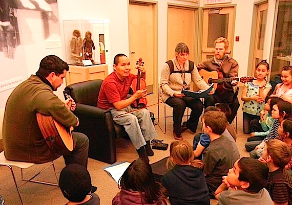 Musicians Danny Lajoie, Ashlee Otokiak, Beth Bellamy and Aaron Bellamy perform Sept. 30 for a group of kids at the May Hakongak library and cultural centre in Cambridge Bay. The music and song capped off a week of literacy activities which included daily after-school reading sessions with community members. (PHOTO BY JANE GEORGE)