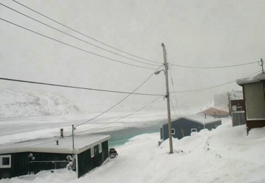 The community of Kimmirut is seen here in a Nov. 30 photo. A blizzard grounded an aircraft search for missing Mayor Jamesie Kottoo on Nov. 29, but an aerial search was to have resumed on the morning of Nov. 30, weather permitting. (PHOTO COURTESY OF KIMMIRUTWEATHER.COM)