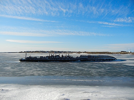 This is how the Maud, better known as the Baymaud to people in Cambridge Bay, looked in early October as the ice was forming around its hull. The ship, once sailed by Norwegian polar explorer Roald Amundsen, sank there 80 years ago and now plans to drag the ship back to Norway have been dealt a blow. Ottawa refused to approve an export permit to the Norwegian promoters, who plan on appealing the decision. (PHOTO BY JANE GEORGE)
