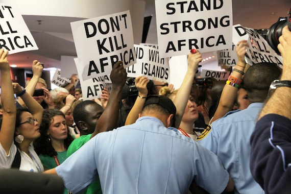 Security forces contain protesters Dec. 9 on the final day of the United Nations climate change conference in Durban, South Africa. (PHOTO BY FRANK TESTER)