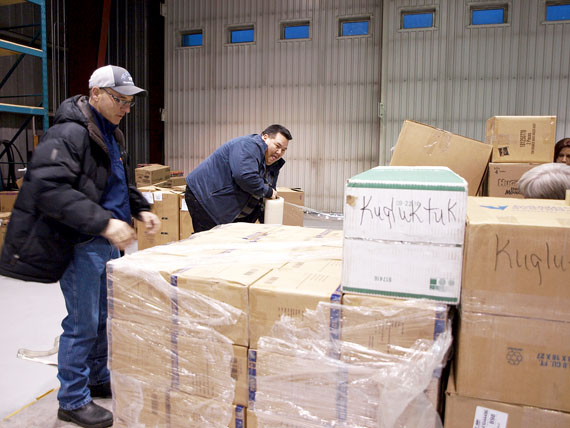 First Air’s Ed Picco (left), and the RCMP’s Jimmy Akavak (right), prepare a pallet full of toys to be shipped to communities throughout Nunavut. The toys were donated as part of the “Toys for the North” campaign, which first started during Toronto’s Santa Claus parade two years ago. The drive collects toys that are then distributed to 12,000 children throughout the North with the help of the RCMP and First Air. (PHOTO BY DEAN MORRISON)