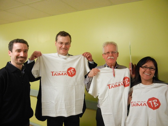 Nunavut's Health Minister Keith Peterson, Nunavut's director of medical affairs, Dr. Sandy MacDonald, and Nunavut MP and federal Health Minister Leona Aglukkaq show their support for the Taima TB campaign by displaying Taima TB t-shirts given to them by Dr. Gonzalo Alvarez, on the left. (PHOTO BY JANE GEORGE)
