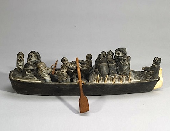If Canada adopted an artist resale royalty, and also applied it to the descendants of late visual artists, last year's $88,750 auction sale of this carving showing a migration scene of Inuit in an umiak, made by the late Ennutsiak of Iqaluit in the 1960s, could bring his family $4,437. (FILE PHOTO)