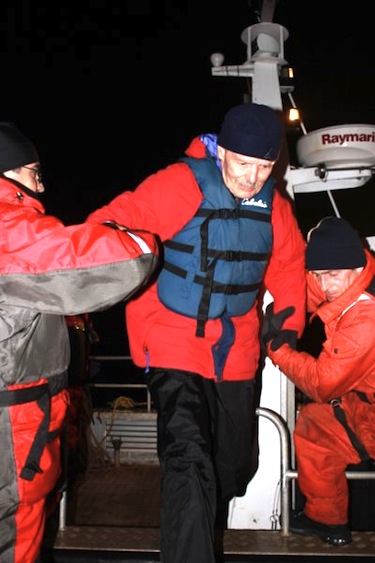 Here an elderly passenger on board the Clipper Adventurer arrives in Kugluktuk in the early hours of Aug. 19, 2010. The Transportation Safety Board report into the Aug. 27 grounding of the ship suggests that a decision to refloat the ship put passengers at risk. (FILE PHOTO)