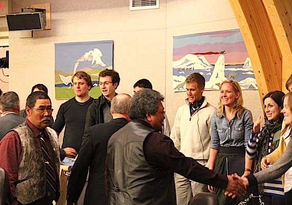 Nunavut MLAs shake hands in the Nunavut assembly May 29 with a group of parliamentary interns from Ottawa. During the opening day of the Nunavut legislature's sitting, the interns heard discussions about Nunavut issues like food security, Inuktitut language protection, airport security and dust problems in communities. Read more later about what the Government of Nunavut ministers and MLAs said later on Nunatsiaqonline.ca. (PHOTO BY SAMANTHA DAWSON)
