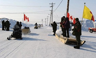 Canadian Rangers patrols return to Resolute Bay on April 25, after completing sovereignty patrols during Operation Nunavlivut 2012. The return was marked by a closing ceremony as they rode their snowmobiles past dignitaries. Canada 