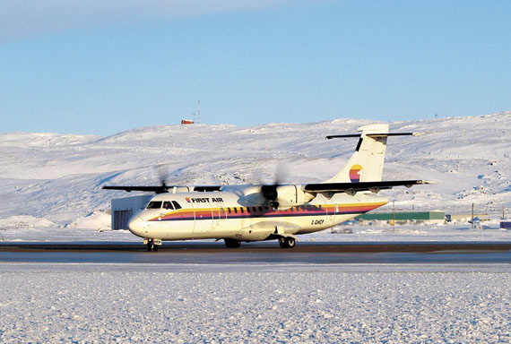 A First Air ATR at the Iqaluit airport in an undated file photo. The board of Makivvik Corp. has decided to retain full ownership of the airline. (FILE PHOTO)