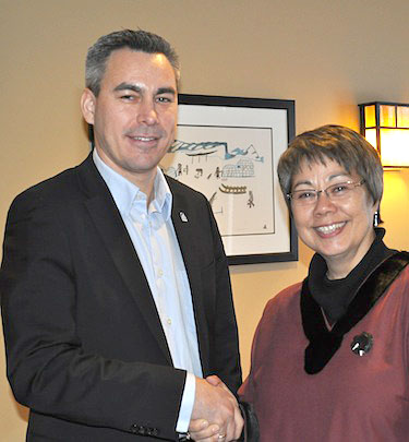 Nunavut Premier Eva Aariak and Greenland's minister of education and research, Palle Christiansen, say goodbye after successfully co-hosting the Circumpolar Conference on Education for Indigenous People this week in Iqaluit. (PHOTO COURTESY OF THE GOVERNMENT OF NUNAVUT)
