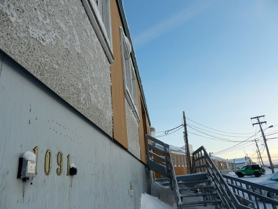 After Dec. 10, Iqaluit residents will have to hike all the way out to building 1091 to receive public health services. Building 155 in Iqaluit, which for decades served as a community public health centre, now lies empty and unused. The Iqaluit Public Health and Family Practice will close Dec. 6 and Dec. 7 to prepare for the move. Public health services, including flu shots, tuberculosis programs, sexual health clinics, well child appointments, and nurse practitioner appointments will resume Dec. 10 at building 1091. The GN spokesperson said the health department will hold a press event Dec. 3 to explain a series of service
relocations that will occur in Iqaluit due to renovations at the old Baffin Regional Hospital building. (PHOTO BY JIM BELL)