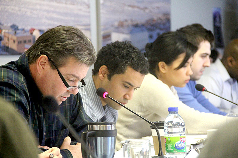 Representatives from Aboriginal Affairs and Northern Development and the Government of Nunavut at the Nunavut Impact Review Board’s project certificate workshop for the Mary River iron project Dec. 18 in Iqaluit at the Frobisher Inn’s Koojesse Room. The workshop is part of a two-day meeting that will run until Dec. 19. (PHOTO BY SAMANTHA DAWSON)