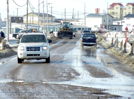 Iqaluit's pothole season gets a kick-start as snow melts March 21 in Iqaluit, where the day's high reached 1.4 C. That temperature is more than 17 degrees higher than the normal -17.7 C level for March 21 in Iqaluit. The high of 1.4 C broke the previous record of 0.6 C set March 21, 1955. The lowest temperature for March 21 on the Environment Canada record was set March 21, 1972, when the temperature dipped to -36.7 C. (PHOTO BY JANE GEORGE)
