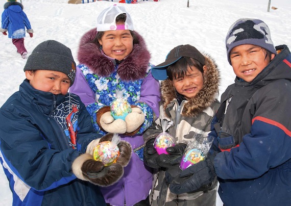 Four students from Ulluriaq School in Kangiqsualujjuaq display eggs that the Easter Bunny left them for their good behaviour during recess over the past few weeks. Nunatsiaq News staff members may not get eggs, but we are taking a break from Nunatsiaqonline.ca, starting March 29. We'll be back April 2. Check back online for breaking news. Happy Easter! (PHOTO BY PASCAL POULIN)