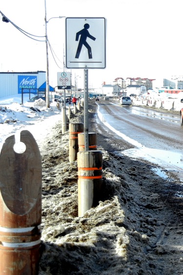 Posts like these are used in Iqaluit to separate the sidewalks from the roads. (PHOTO BY JANE GEORGE)