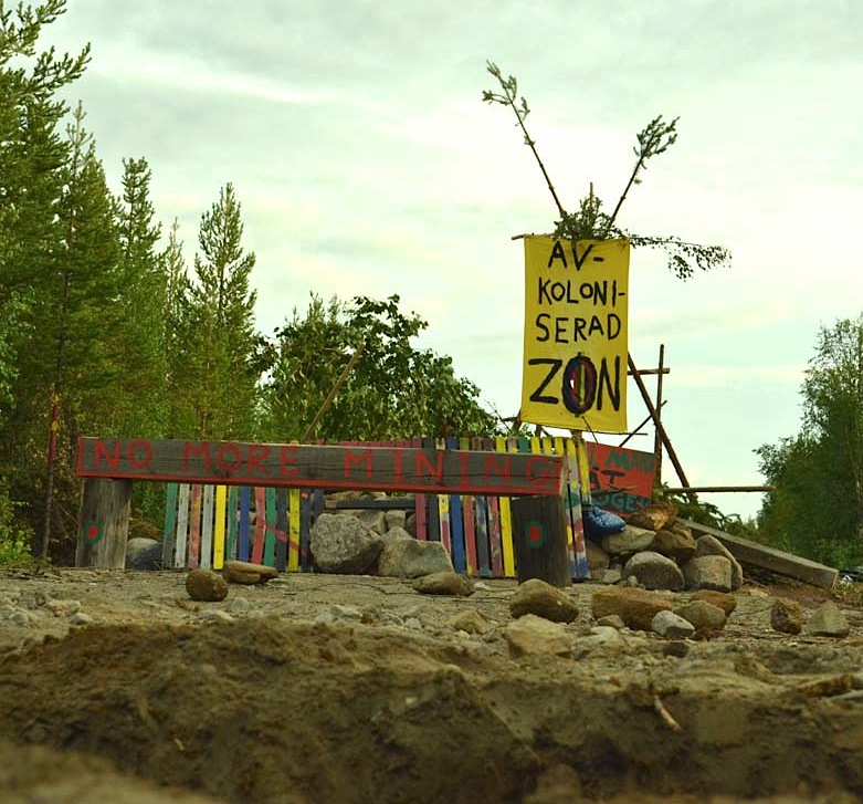 A look at the blockade erected in northern Sweden, where Saami are protesting against an iron mine project, which reads 