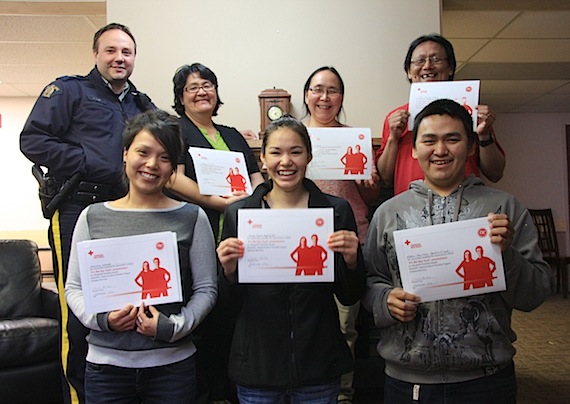 This group of school and community counsellors, and youth mentors in Baker Lake, including RCMP Cpl. Jonathan Saxby, were all smiles Sept. 13 after completing their training as RespectEd educators, provided by the Canadian Red Cross. The group will deliver abuse-prevention awareness to youth of the community. (PHOTO COURTESY OF SARAH BURKE)