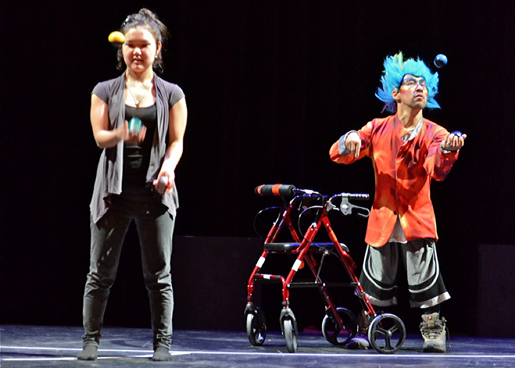 Billie-Minnie Kooktook-Anderson, a secondary 1 student, and Charlie Ekomiak, show off their juggling skills at a CIRQINIQ show in Kuujjuaq for National Child Day Nov. 20. CIRQINIQ will be putting on another show at Jaanimmarik School Friday, Nov. 29, at 6 p.m. (PHOTO BY ISABELLE DUBOIS)