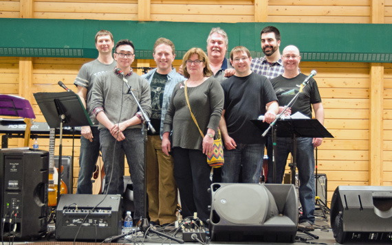 Members of Cambridge Bay band Latitude 69; Jim Barta, Mason Greenly (sound), Miguel Chenier, Gary Collins, Craig LeBleu, Ryan Barry, and Terry Kee pose with Angela Phillips, front centre, at a March 29 community fundraiser. Phillips helped organize the event, which raised $5,400 for the Cross Cancer Institutes as well Women in Action 2014. Cambridge Bay mayor Jeannie Ehaloak, the event's MC, took part in last year's Women in Action - Steps of Hope, with a group who walked from Bay Chimo to Cambridge Bay. (PHOTO BY DENISE LEBLEU IMAGES)


 
