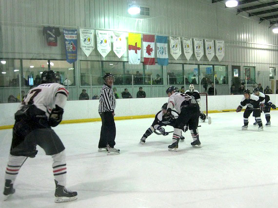 Team Rankin Inlet and Iqaluit line up for a face-off at the Arctic Winter Games Arena in Iqaluit during the 2013 Northern Hockey Challenge tournament. The two rivals will do so again in a shortened version of the tournament, April 25 to 27, in Iqaluit. (FILE PHOTO)