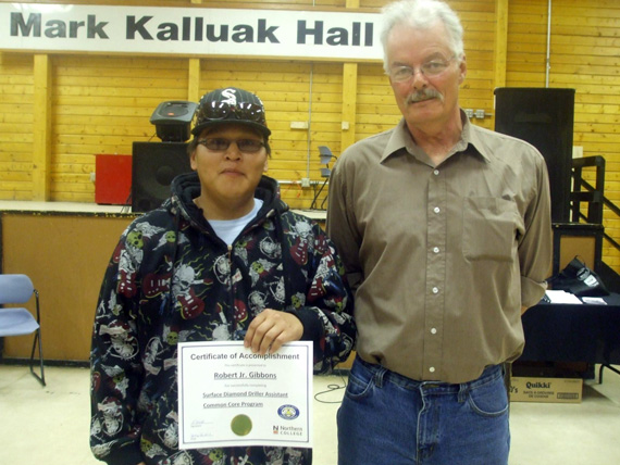 Arviat drilling student Robert Gibbons, left, poses with his drilling instructor Rob Hood after completing a diamond drilling course. The two men left Arviat by snowmobile on May 10. (PHOTO COURTESY OF HARMONY HOOD) 