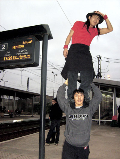 The late Solomon Uyarasuk, top, stands on the shoulders of Artcirq member Jacky Qrunnut at a train station in Morocco, en route to Timbuktu, Mali during an Artcirq visit to the Festival au Desert in January 2008. (FILE PHOTO) 