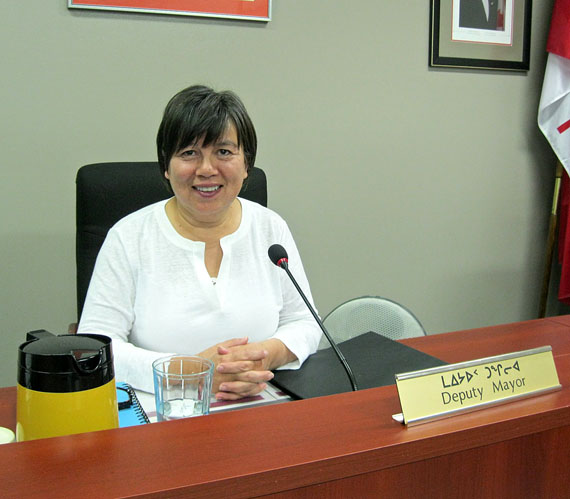 Iqaluit’s deputy mayor, Mary Wilman, has served as acting mayor since May. Since July, she has been paid the same salary as the mayor would receive, on a pro-rated basis. (PHOTO BY PETER VARGA)