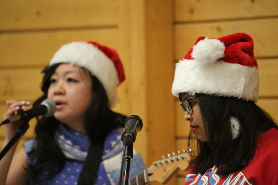 Gloria Guns and Christine Aye of Scary Bear Soundtrack at a coffee house held Nov. 30 in Cambridge Bay, following the community's Santa Claus parade, held to raise funds for the local food bank. (PHOTO BY RED SUN PRODUCTIONS)
