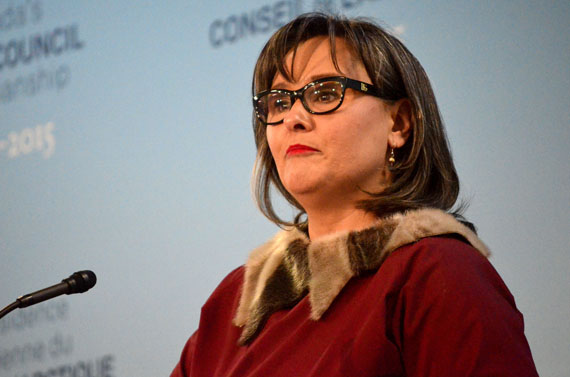 Leona Aglukkaq, the Nunavut MP and federal minister responsible for the Arctic Council, speaks at the March 25 opening in Iqaluit of a circumpolar wellness symposium that brings together representatives from the Arctic Council's eight member states and its indigenous permanent participant organizations. “We recognize that this is an issue that affects the entire circumpolar North,” Aglukkaq said, saying the people of the Arctic want mental health services based on the needs of their communities that take their particular cultures into account. She also pushed for the involvement of youth in tackling mental health issues. The symposium continues until March 27. (PHOTO BY JIM BELL)