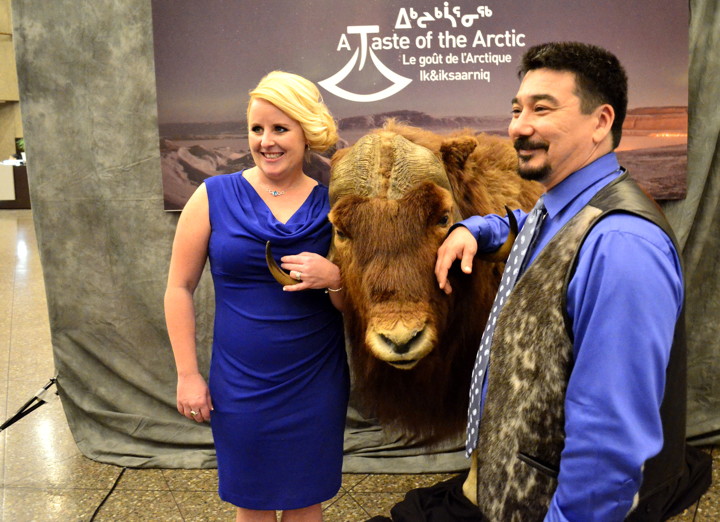 ITK President Terry Audla and his partner Terri Lynn Potter, pose at the muskox photo booth at the March 10 A Taste of the Arctic event in Ottawa. Audla says he invited Don Cherry to attend the seal-friendly event but he declined. (PHOTO BY JIM BELL)