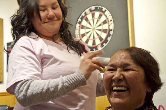 Edna Elias, the commissioner of Nunavut, is pictured having her head shaved last year during a Women in Action fundraiser for breast cancer research. (FILE PHOTO) 
