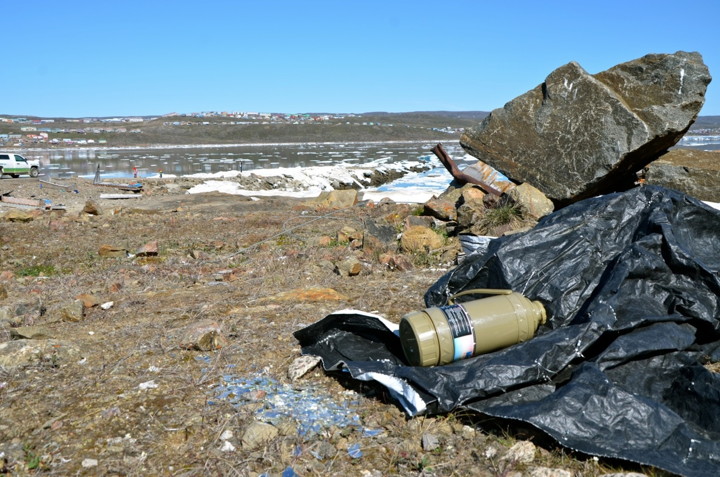 Scraps of mystery metal, bits of plastic, canisters, shards of broken glass, junk food wrappers and crushed beer and pop cans cover the area around Iqaluit's causeway. Iqaluit resident Lana Dawiskiba is organizing a clean up at the causeway on Saturday July 25 from 10 a.m. to 12 p.m. Some garbage bags and cotton gloves are being provided by the City of Iqaluit but people are welcome to bring their own supplies. The group is starting on the causeway's shoreline and will work its way towards the dump area. 