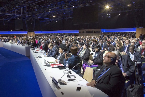 Delegates at Dec. 8 plenary session of the United Nations climate change conference are likely to meet beyond the planned Dec. 11 wrap-up for COP21. (PHOTO BY UNFCCC)