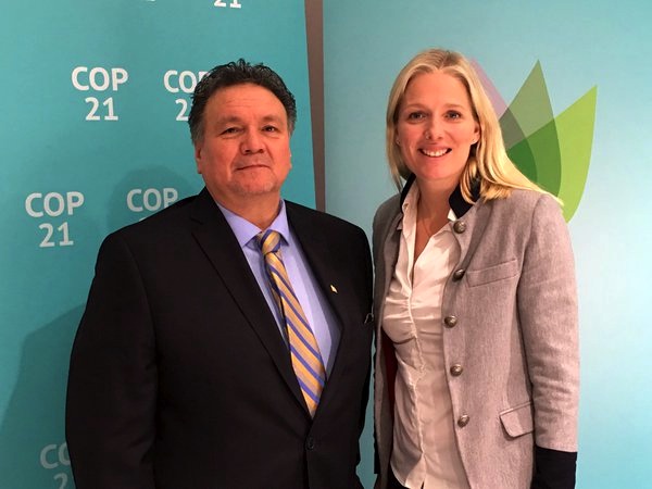 Nunavut Premier Peter Taptuna and the federal environment and climate change minister Catherine McKenna stand together Dec. 7 at the COP21 talks in Paris, which are now entering their second week. (PHOTO COURTESY OF P. TAPTUNA)