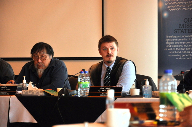 Qikiqtani Inuit Association president PJ Akeeagok, right, chairs the QIA's board meeting in Iqaluit Feb. 17. Besides updates from the president, vice president and secretary treasurer on their efforts in 2015, board members will also discuss proposed operational changes to the Mary River mine and the ongoing negotiations of the Inuit Impact Benefit Agreement with the mine's owner, Baffinland Iron Mines Corp. The QIA's board of directors meeting wraps up today, Feb. 18, at Iqaluit's Frobisher Inn. At the Feb. 18 meeting, board members learned that Baffinland now proposes a railway from Mary River to Milne Inlet to transport iron ore and will delay submission of its environmental impact statement from April 2016 until September 2016. Read more later on Nunatsiaqonline.ca. (PHOTO BY THOMAS ROHNER)
