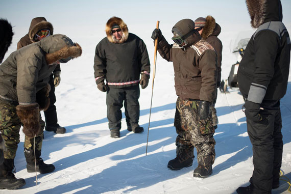 Joe Karetak, centre, leads young hunters through the early steps of building in igloo outside of Arviat March 23. The intensive two-week program, led by Keenan Lindell and Dylan Clark, aims to show a group of Arviat youth how to navigate and survive out on the land, from building shelter, harvesting, wilderness First Aid and how to navigate near the floe edge. The program runs until March 31. (PHOTO BY DYLAN CLARK) 