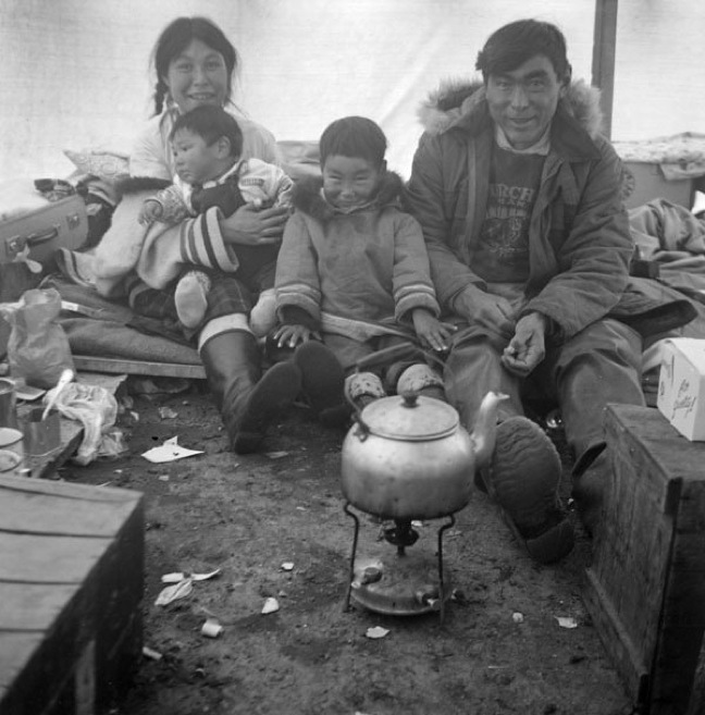 'Teatime with artist Kenojuak & husband Johnnybo & kids' - (Inuit) - Kinngait, Nunavut 1960, Library and Archives Canada. (PHOTO BY R. GILLIAT)
