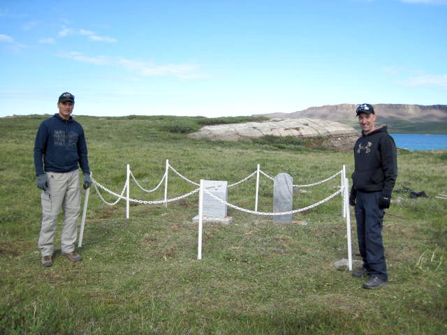 Members of the Kugluktuk RCMP detachment at the grave of Cpl. William Andrew Doak and trader Otto Binder, both of whom were murdered in 1922 at Tree River. (PHOTO COURTESY OF THE RCMP)