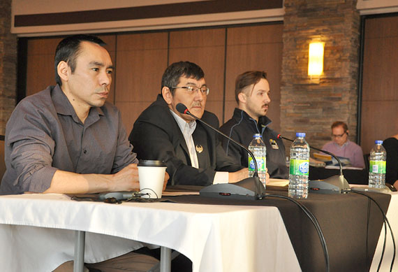 Here, Olayuk Akesuk (centre), sits with Enookie Inuarak and Stephen Williamson-Bathory of the Qikiqtani Inuit Association at the 2016 annual general meeting of the Qikiqtani Inuit Association, where they made a presentation on the Inuit Impact and Benefit Agreement with Baffinland Iron Mines Corp. (FILE PHOTO)