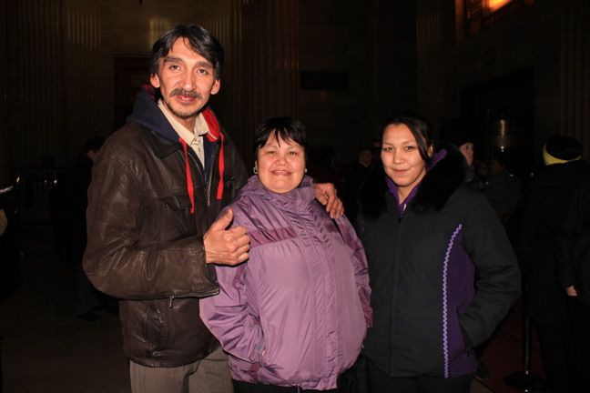 Jerry Natanine with his wife Christine and daughter Clara in the lobby of the Supreme Court of Canada Nov. 30 following a hearing before the court's nine judges on whether Inuit were properly consulted before the National Energy Board granted a consortium of companies permission to conduct seismic testing off the east coast of Baffin Island in 2014. (PHOTO BY LISA GREGOIRE)